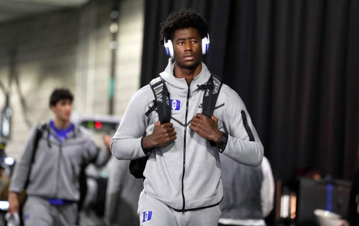 Dukes AJ Griffin (21) heads to the locker room before Dukes game against Arkansas in the NCAA Tournament West Regional finals at the Chase Center in San Francisco, Calif., Saturday, March 26, 2022.