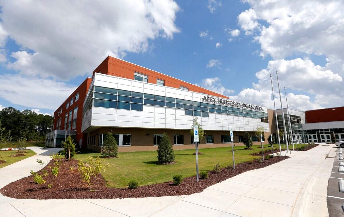 The front of Apex Friendship High School in Apex, N.C., in this 2015 file photo. Despite being less than 10 years old, it had to close for multiple days this school year due to the HVAC system not working at full capacity.