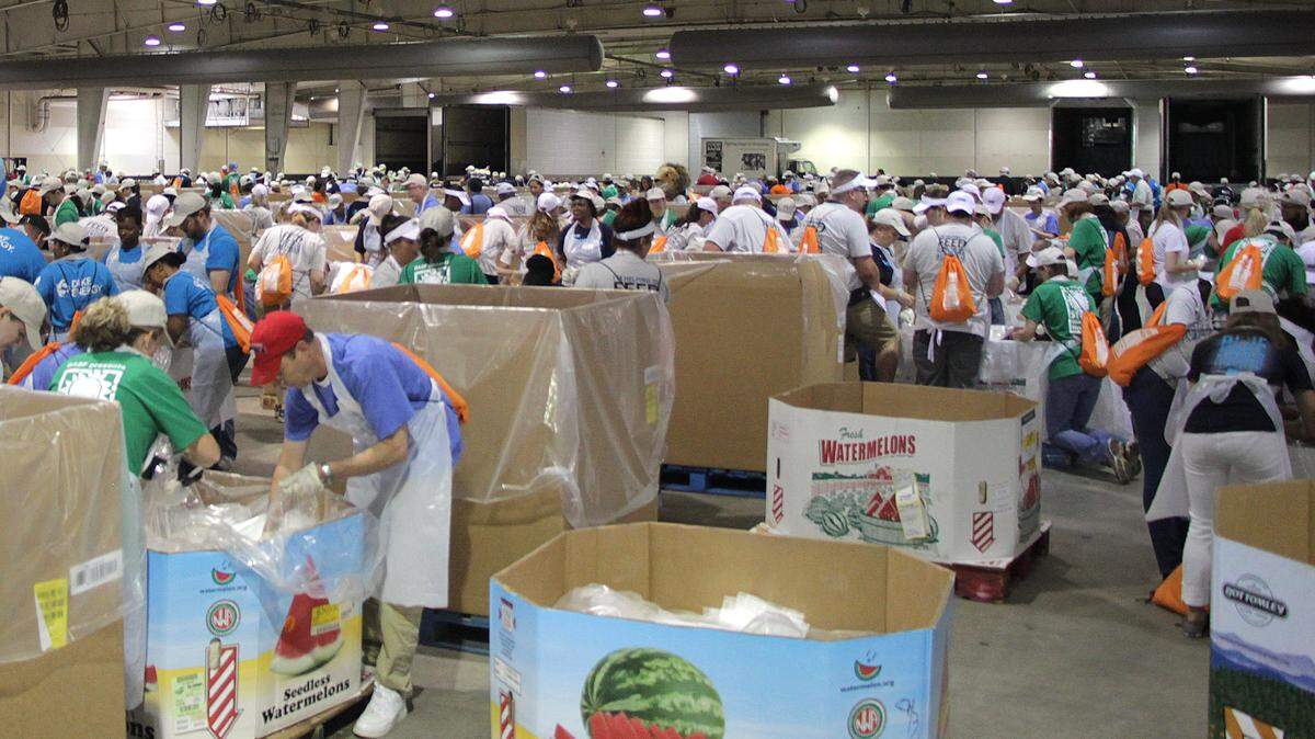 Volunteers sort rice during the Food Bank of Central & Eastern North Carolina Sorta-A-Rama at the Graham Building at the N.C. State Fairgrounds in 2016. The Food Bank of Central & Eastern North Carolina received $1.4 million in PPP funds.