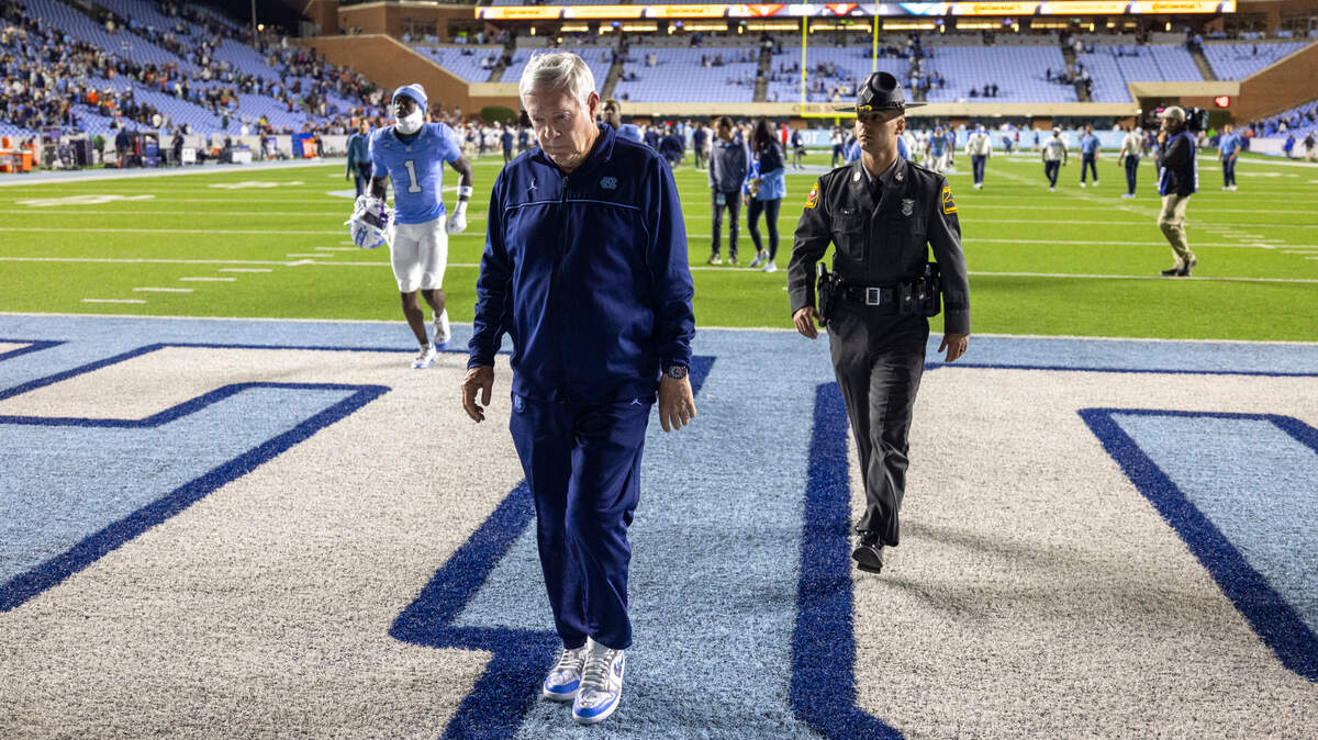 North Carolina coach Mack Brown leaves the field following the Tar Heels’ 31-27 loss to Virginia on Saturday, October 21, 2023 at Kenan Stadium in Chapel Hill, N.C.
