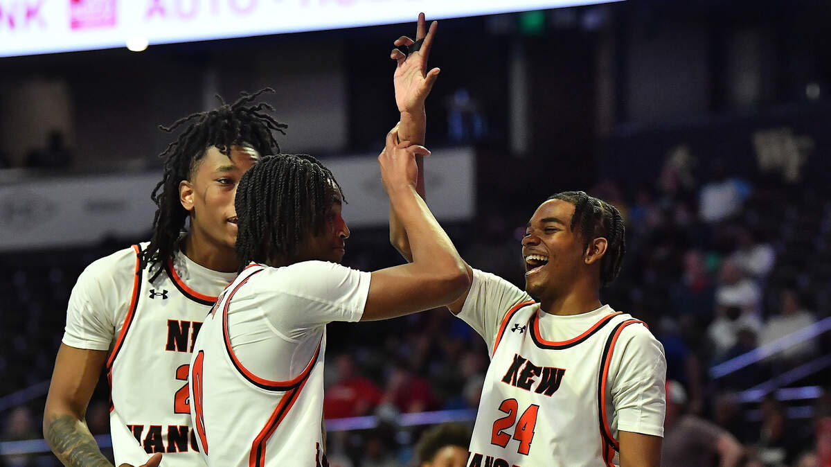 New Hanover’s Jakim Beatty (24) celebrates with teammates at the end of the first half against Sanderson in the NCHSAA 4a Boys East Regional Final. The Sanderson Spartans and the New Hanover Wildcats met in the NCHSAA 4A East Regional Final in Winston-Salem, N.C. on March 12, 2025.