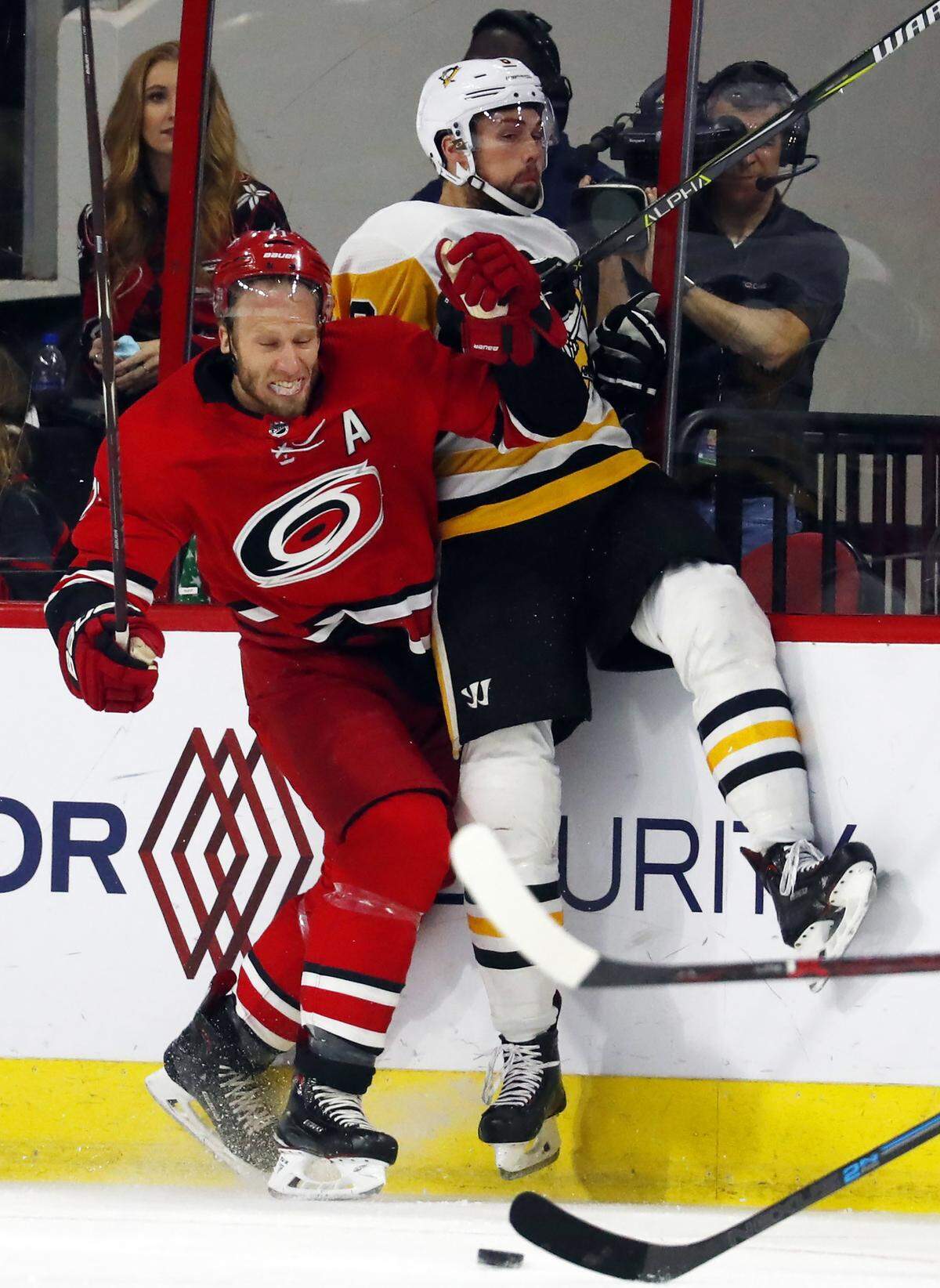 Carolina Hurricanes’ Jordan Staal, left, collides with Pittsburgh Penguins’ Brian Dumoulin, right, during the first period of an NHL hockey game, Saturday, Dec. 22, 2018, in Raleigh, N.C. (AP Photo/Karl B DeBlaker)