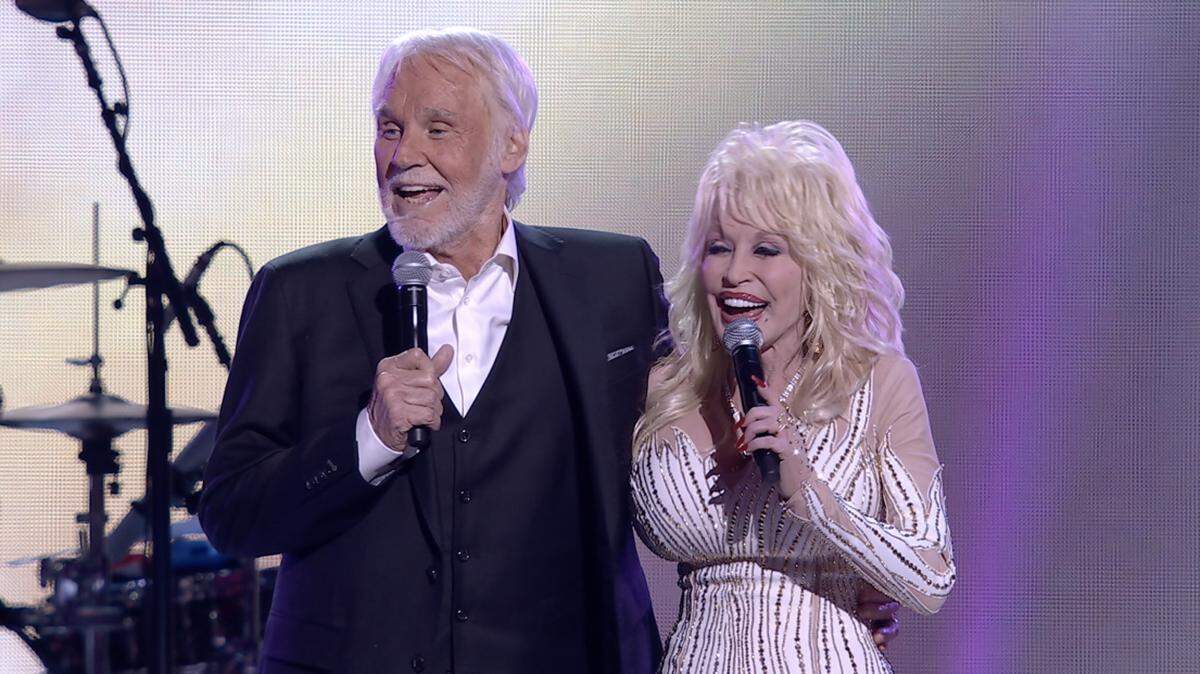 Kenny Rogers and Dolly Parton perform together one last time for the CBS special “Kenny Rogers: All in for the Gambler.” Rogers died in March 2020.