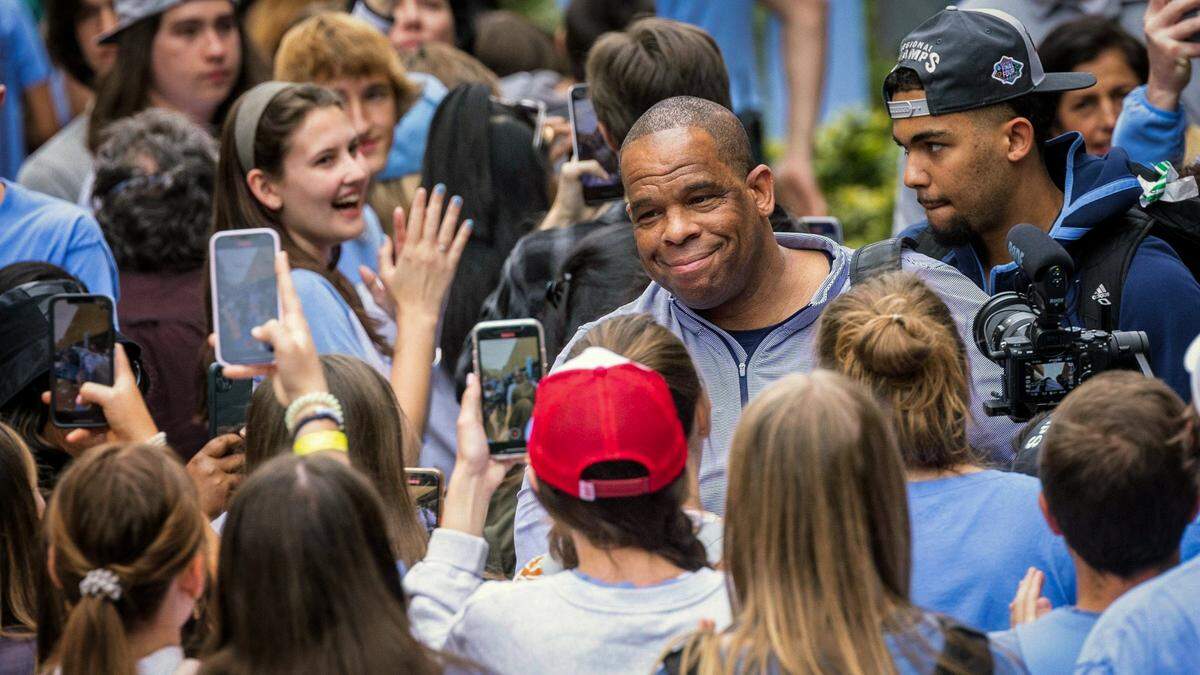 Head Coach Hubert Davis and the UNC's men's basketball team receive a warm welcome at the Dean Smith Center Tuesday, April 5, 2022 after falling to Kansas in the NCAA championship.