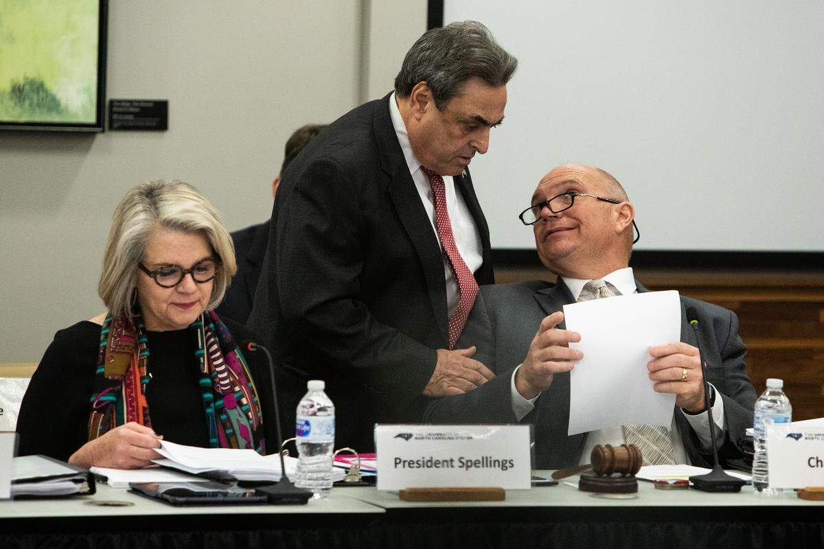 From left, UNC President Margaret Spellings, Board of Governors member Robert Rucho and Chairman Harry L. Smith, Jr. get ready start a UNC Board of Governors meeting on Friday, Dec. 14, 2018 at the UNC Center for Leadership Development at UNC-Chapel Hill. As a decision about the Silent Sam Confederate monument looms, UNC-Chapel Hill leaders face intense opposition to their proposal to create a $5.3 million history center on campus to house the statue.