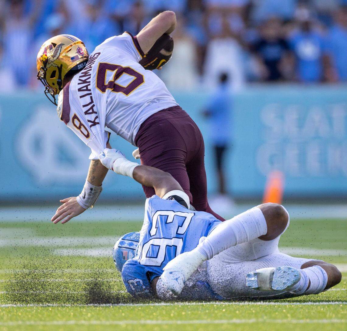 North Carolina’s Jacolbe Cowan (93) sacks Minnesota quarterback Athan Kaliakmanis (8) in the fourth quarter on Saturday, September 16, 2023 at Kenan Stadium in Chapel Hill N.C.