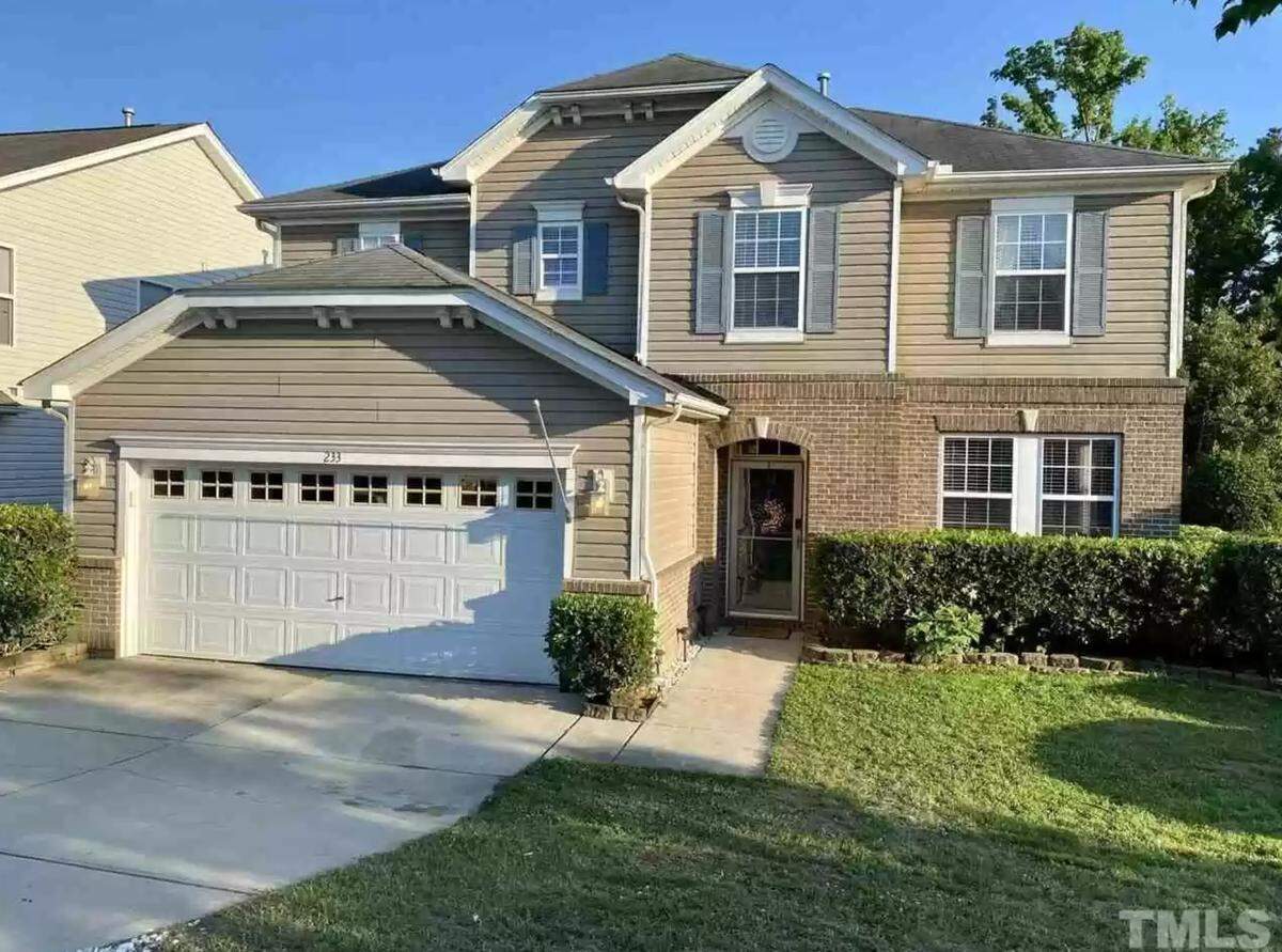 Three-bedroom, two and a half-bathroom open concept house for sale in Fuquay Varina with a spacious 2,635 square feet, built in 2014.