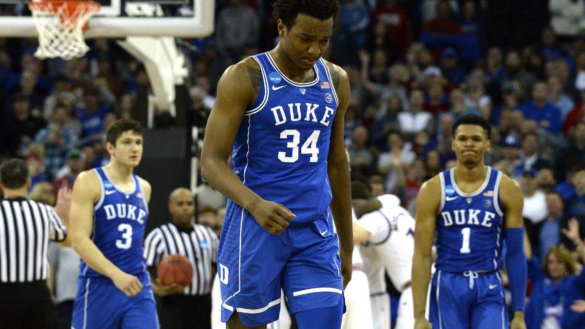 Duke forward Wendell Carter Jr (34) reacts as he heads back to the bench after fouling out against the Jayhawks. Duke lost to Kansas in OT 85-81 in the NCAA Elite 8..
