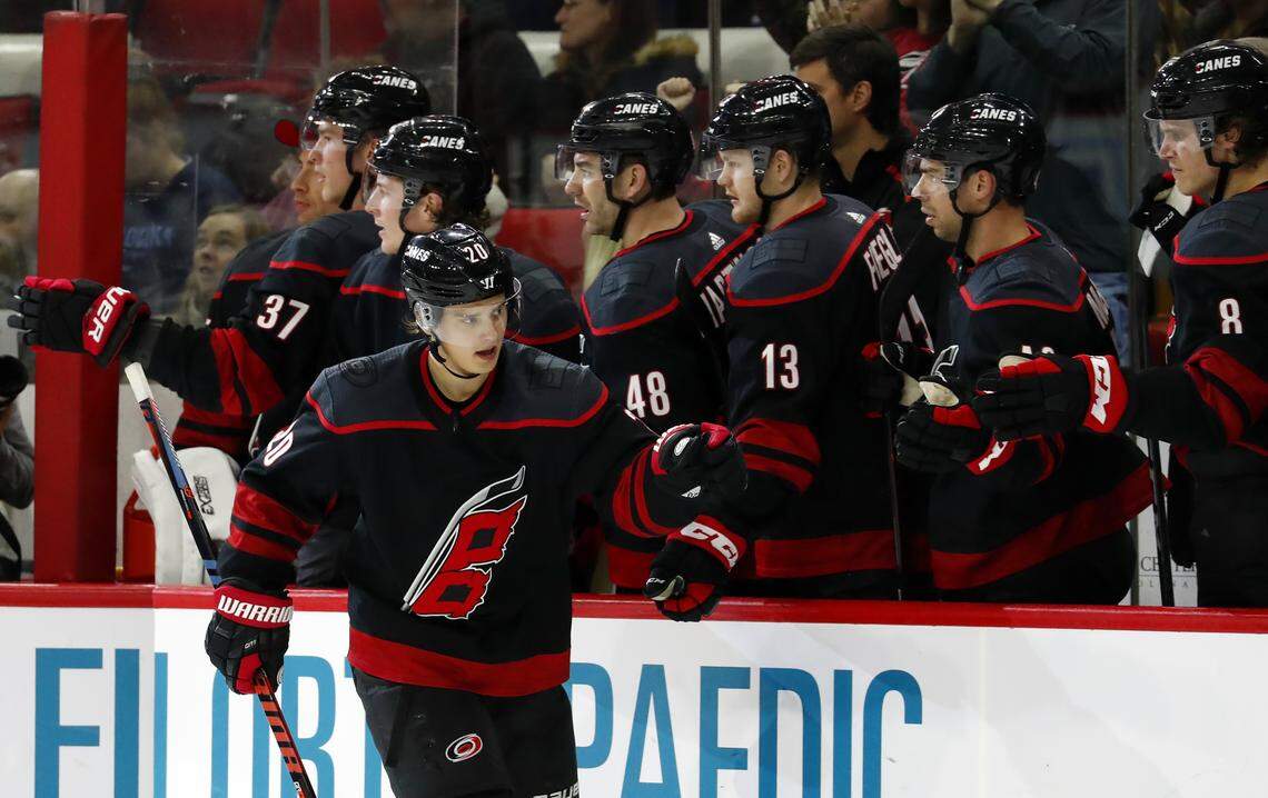 Carolina Hurricanes’ Sebastian Aho (20) is congratulated for his goal during the third period against the Vegas Golden Knights in an NHL hockey game Friday, Feb. 1, 2019, in Raleigh, N.C. (AP Photo/Karl B DeBlaker)