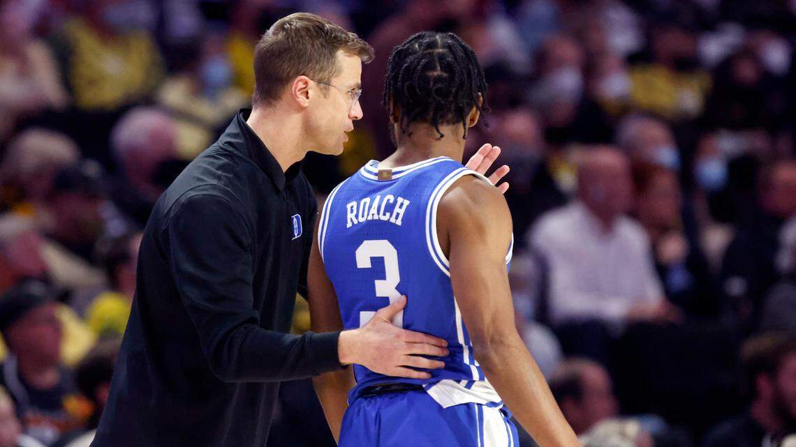 Duke associate head coach Jon Scheyer talks with Jeremy Roach (3) during the second half of Duke’s 76-64 victory over Wake Forest at LJVM Coliseum in Winston-Salem, N.C., Wednesday, January 12, 2022.