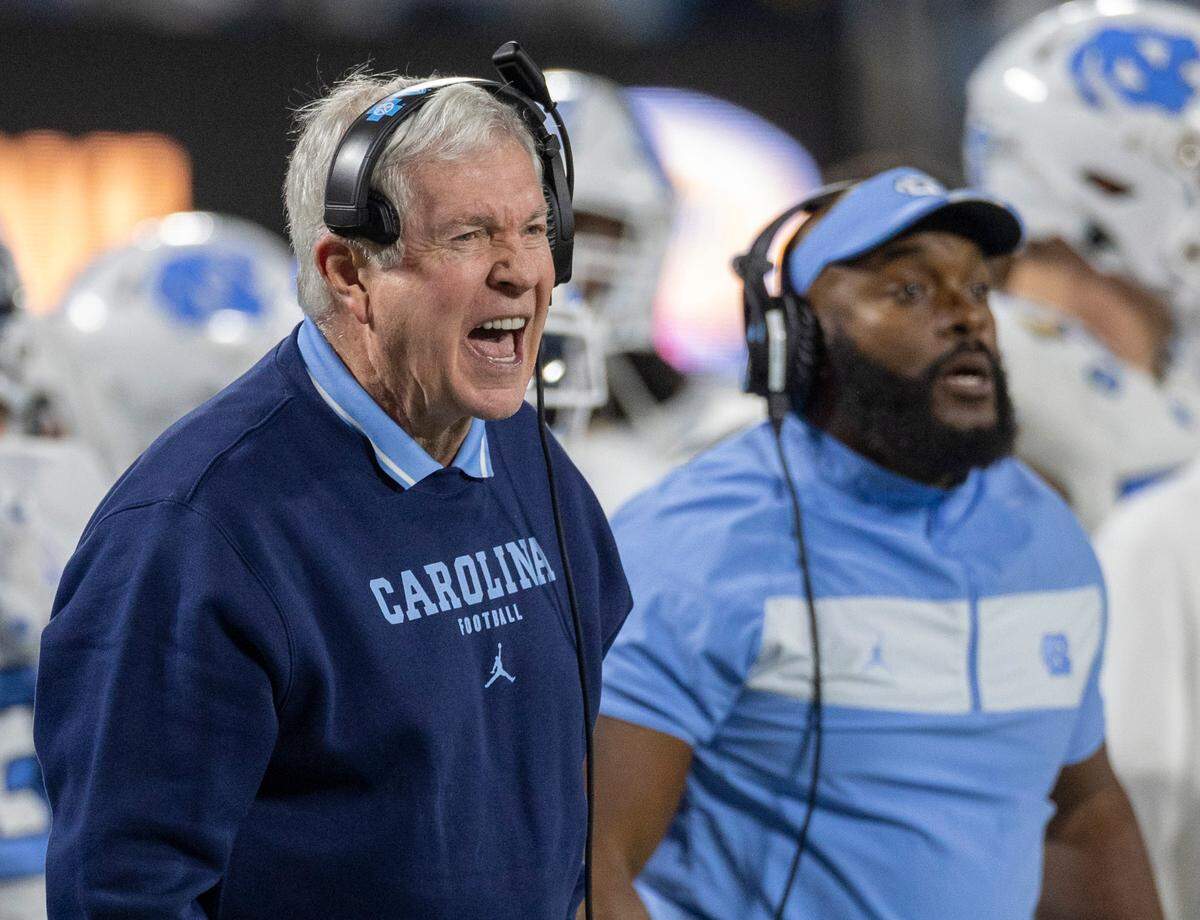 North Carolina coach Mack Brown yells at his defensive unit in the fourth quarter against West Virginia in the Duke’s Mayo Bowl on Wednesday, December 27, 2023 at Bank of American Stadium in Charlotte, N.C.