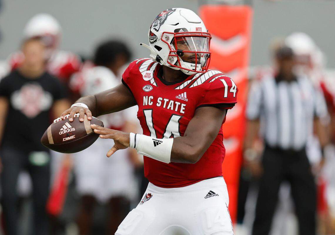 N.C. State quarterback Jack Chambers (14) prepares to pass during the second half of N.C. State’s 55-3 victory over Charleston Southern at Carter-Finley Stadium in Raleigh, N.C., Saturday, Sept. 10, 2022.