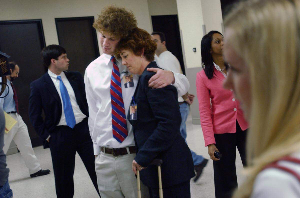 Terrie Myers and Steve Cox console each other after Larry Robert Veeder Jr.  was sentenced in 2004 in the Wake County Courthouse. Veeder was sentenced from eight years, six month to 10 years, eight months for killing six people, including Nolan Myers, Terrie's son and Steve's best friend, after Veeder drove into them drunk November 1, 2003.  