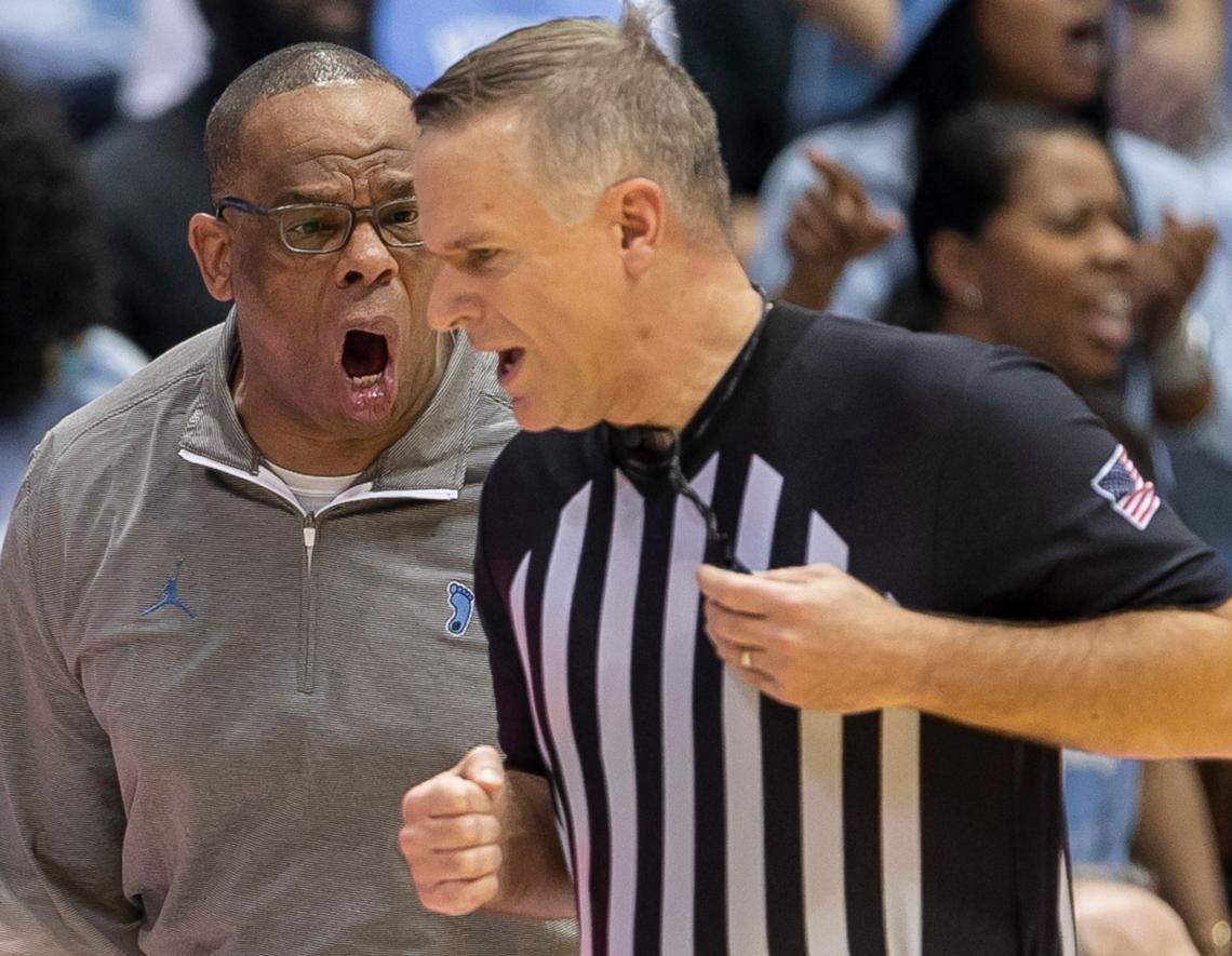 North Carolina coach Hubert Davis has a word with official Paul Szelc in the second half against Miami on Monday, February 13, 2023 at the Smith Center in Chapel Hill, N.C.