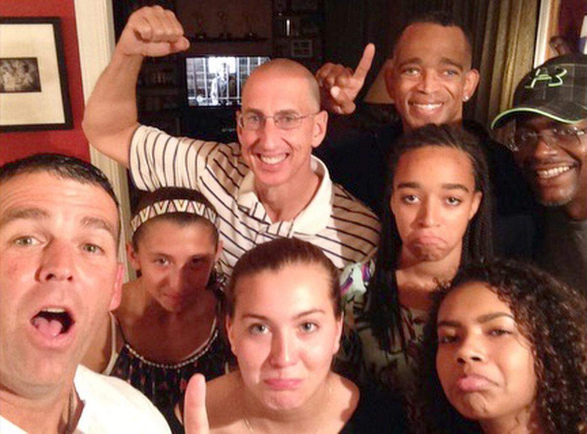 From left, Brian Gallagher, left, Scott Organ, Stuart Scott and Fred Tindal pose with their daughters.