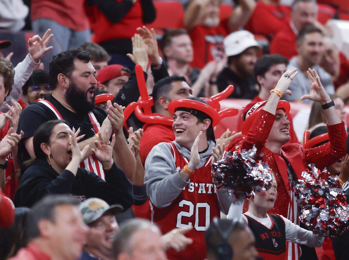 Fans react during the second half of the Wolfpack’s 114-66 win over North Carolina Central at Lenovo Center on Monday, Nov. 3, 2025, in Raleigh, N.C.