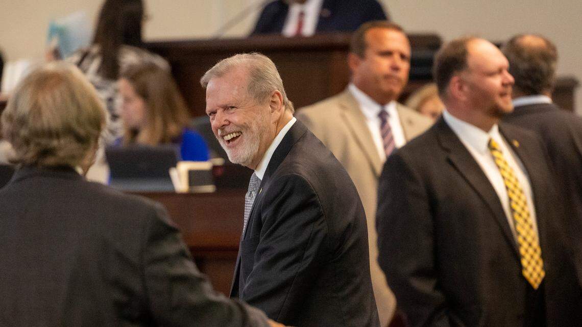Senate President Pro Tempore talks with colleagues on the Senate floor at the General Assembly in Raleigh on Wednesday, Aug 16, 2023.