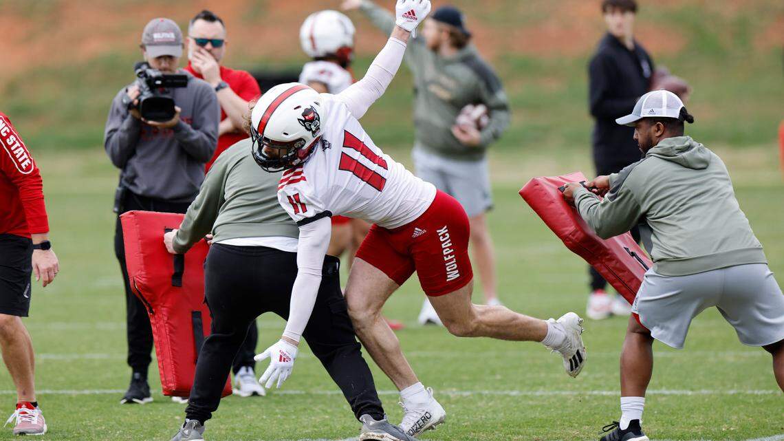 N.C. State linebacker Payton Wilson (11) runs drills during the Wolfpack’s first spring practice in Raleigh, N.C., Wednesday, March 1, 2023.