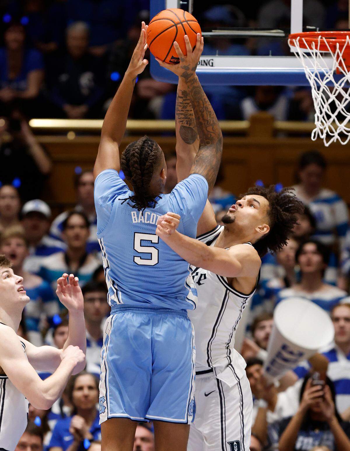 Duke’s Dereck Lively II (1) blocks the shot by North Carolina’s Armando Bacot (5) during the second half of Duke’s 63-57 victory over UNC at Cameron Indoor Stadium in Durham, N.C., Saturday, Feb. 4, 2023.