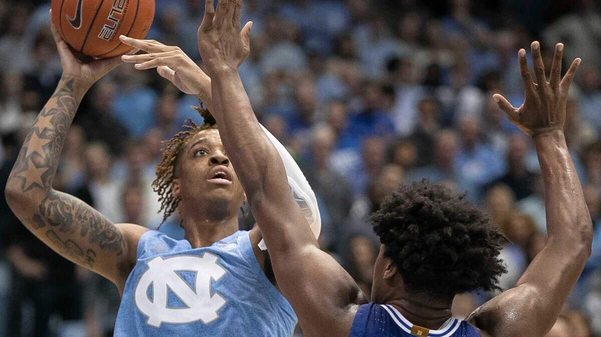 Duke’s Armando Bacot (5) puts up a shot over Duke’s Vernon Carey Jr. (1) during the second half on Saturday, February 8, 2020 at the Smith Center in Chapel Hill, N.C. Bacot scored 12 points in the Tar Heels’ loss.