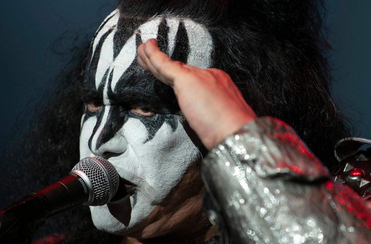 Gene Simmons salutes the crowd as KISS brings their End of the Road World Tour to Raleigh, N.C.’s Coastal Credit Union Music Park at Walnut Creek, Tuesday night, May 17, 2022.