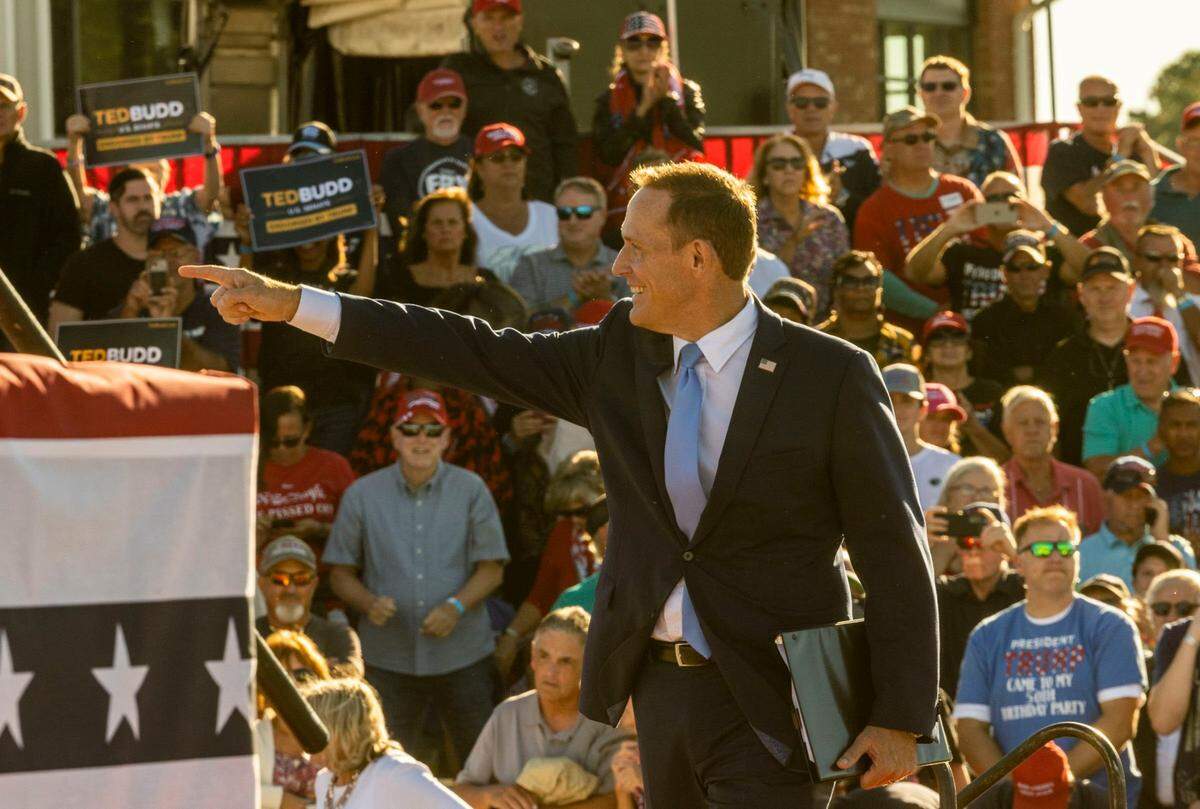 District 13 U.S. Rep. and U.S. Senate candidate Ted Budd takes the stage during a rally featuring former president Donald Trump at Wilmington International Airport Friday, Sept. 23, 2023.