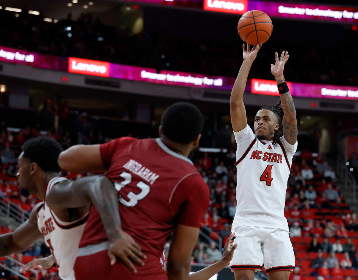 N.C. State’s Breon Pass puts up a shot during the second half of the Wolfpack’s game against Rider on Sunday, Dec. 22, 2024, at Lenovo Center in Raleigh, N.C.