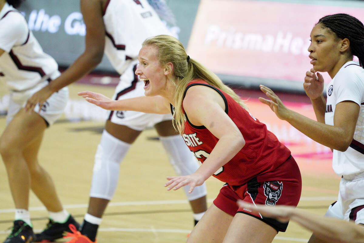 North Carolina State center Elissa Cunane, left, calls for the ball, next to South Carolina forward Victaria Saxton during the first half of an NCAA college basketball game Thursday, Dec. 3, 2020, in Columbia, S.C. N.C. State won 54-46.