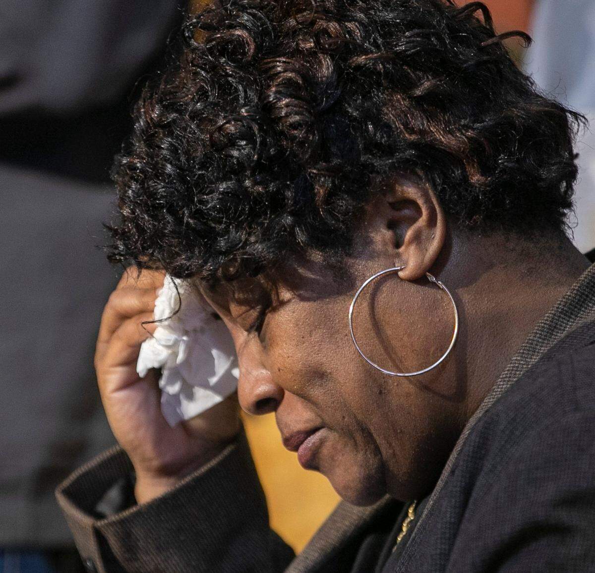 Sonya Williams, the mother of Darryl Williams, weeps while civil rights attorney Ben Crump speaks during a press briefing in February 2023 at Mount Peace Baptist Church in Raleigh.