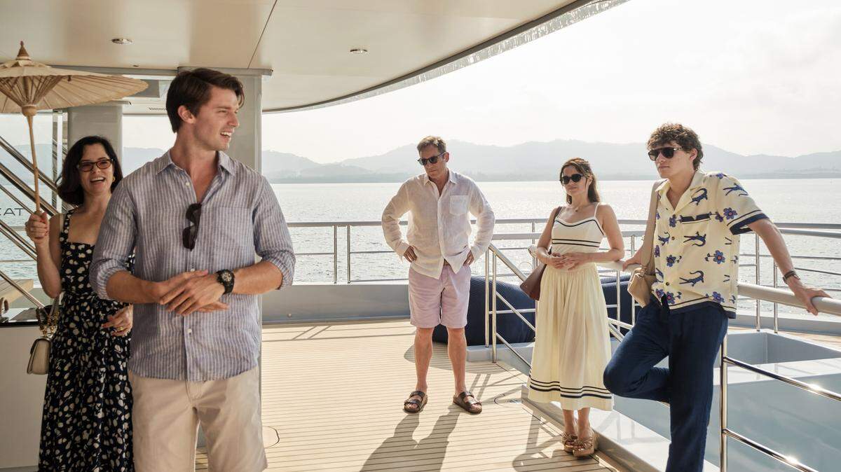 Jason Isaacs, Parker Posey, Patrick Schwarzenegger, Sarah Catherine Hook and Sam Nivola in season 3 of “The White Lotus” on HBO.