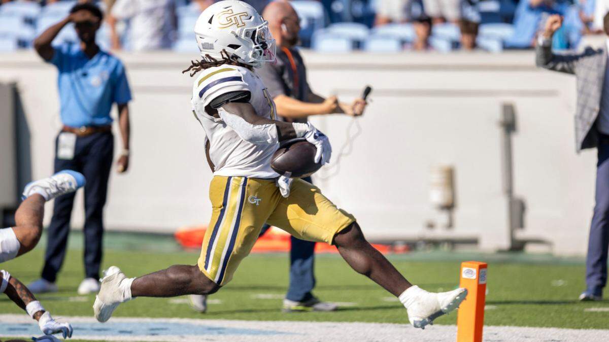 Georgia Tech running back Jamal Haynes (11) scores the game winning touchdown on a 68 yard run with 16 seconds to play in the game, to secure a 41-34 victory over North Carolina, handing the Tar Heels their fourth loss in a row on Saturday, October 12, 2024 at Kenan Stadium in Chapel Hill, N.C.