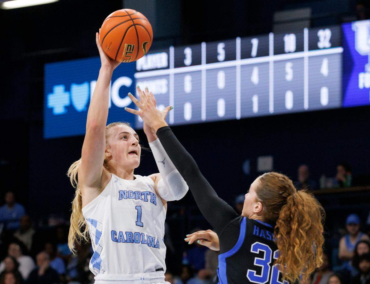 North Carolina’s Alyssa Ustby shoots over Kentucky’s Amelia Hassett during the first half of the Tar Heels’ game on Thursday, Dec. 5, 2024, at Carmichael Arena in Chapel Hill, N.C.