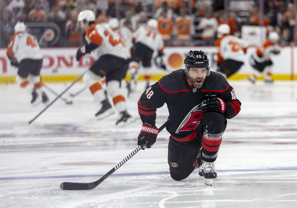 Carolina Hurricanes left wing Jordan Martinook (48) stretches during warms up for Game 1 against Philadelphia on Saturday, May 2, 2026, during the second round of the Stanley Cup Playoffs at Lenovo Center in Raleigh, N.C.