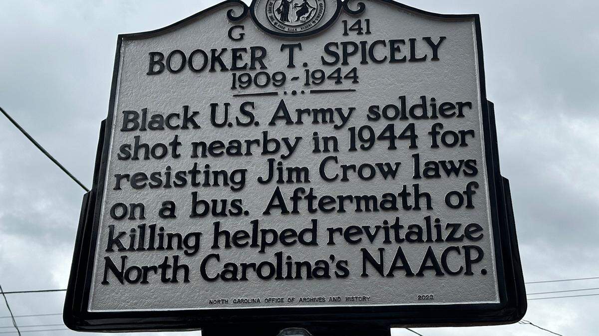 A state highway historical marker, unveiled Friday, Dec. 1, 2023, in Durham, honors a Black World War II soldier shot and killed by a bus driver after initially resisting a demand that he move to the back of the bus.