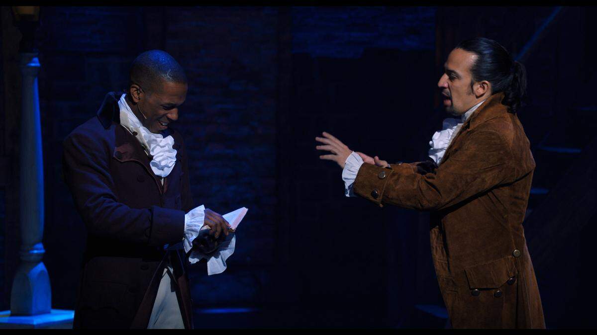 Lin-Manuel Miranda, right, is Alexander Hamilton, and Leslie Odom Jr., left, is Aaron Burr in “Hamilton.”