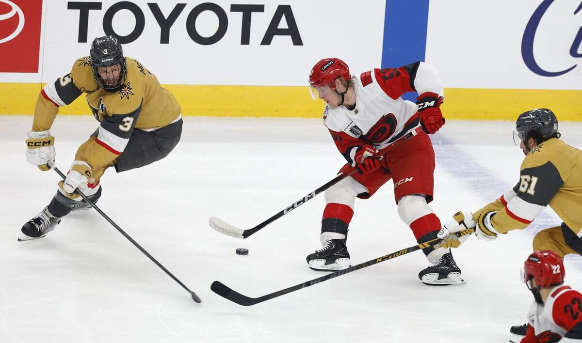 Carolina's Jackson Blake (53) brings the puck up as Vegas' Brayden McNabb (3) and Vegas’ Mark Stone (61) defend during the first period of the Hurricanes’ game against the Golden Knights in Game 6 of the Stanley Cup Final at T-Mobile Arena in Las Vegas, Nev., Sunday, June 14, 2026.