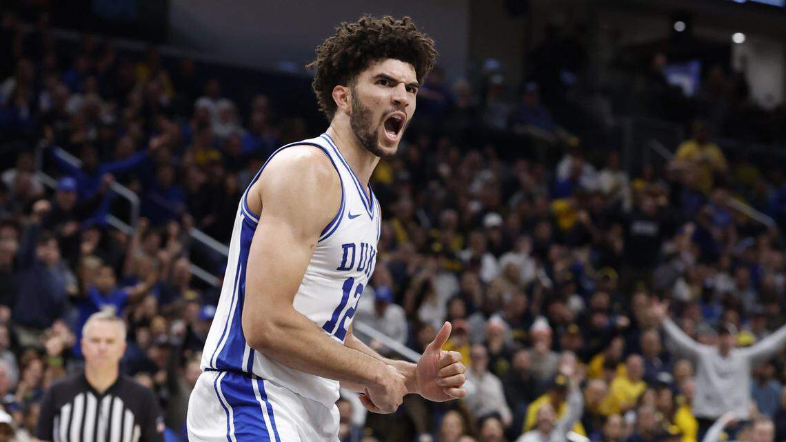 Duke’s Cameron Boozer celebrates after slamming in two in the second half of Duke’s 68-63 victory over Michigan in the Capital Showcase at Capital One Arena in Washington, D.C., Saturday, Feb. 21, 2026.