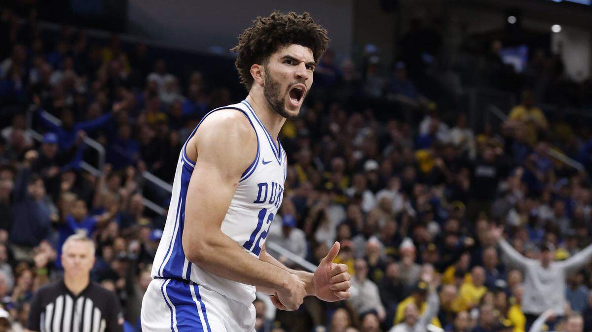 Duke’s Cameron Boozer (12) celebrates after slamming in two in the second half of Duke’s 68-63 victory over Michigan in the Capital Showcase at Capital One Arena in Washington, D.C., Saturday, Feb. 21, 2026.