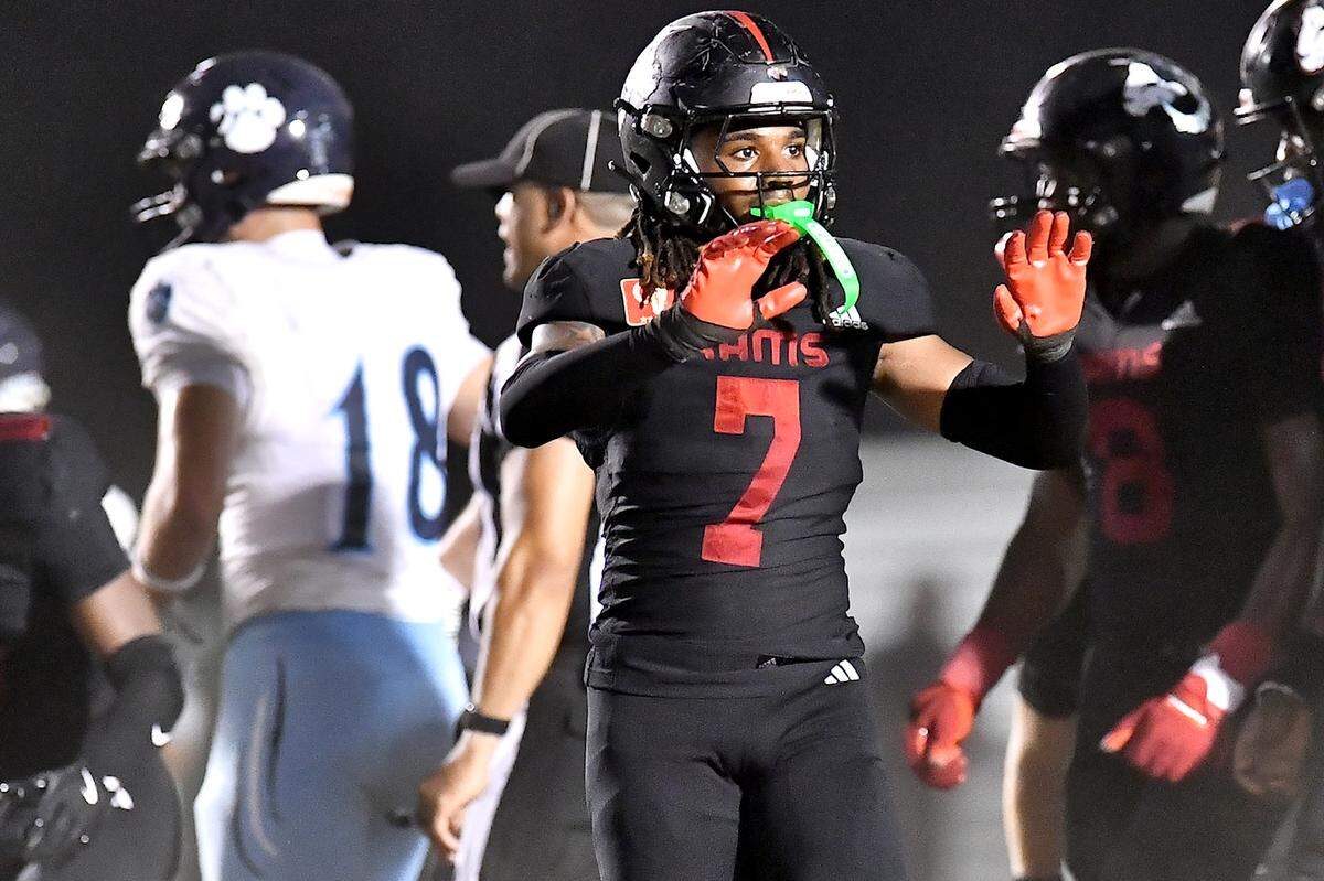 Rolesville's Avery Fleet (7) reacts after Millbrook converted a fourth down during the second half. The Millbrook Wildcats and the Rolesville Rams met in a conference football game in Rolesville, N.C. September 26, 2025
