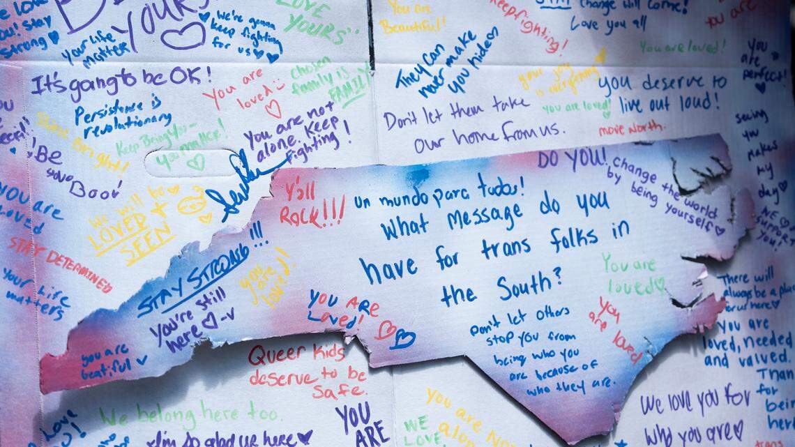 Messages are written on a board to uplift the LGBTQ community at the Out! Raleigh Pride festival in downtown Raleigh on Saturday, June 21, 2025.