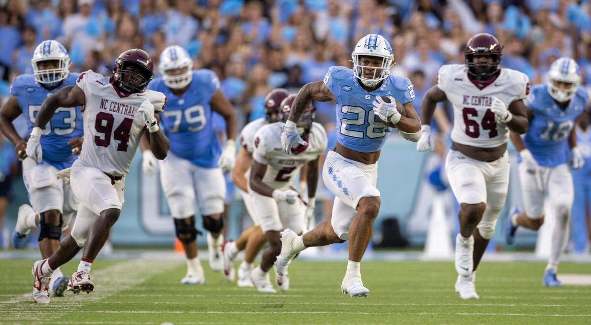 North Carolina running back Omarion Hampton (28) breaks open for a 53-yard gain in the second quarter against North Carolina Central on Saturday, September 14, 2024 at Kenan Stadium in Chapel Hill, N.C.