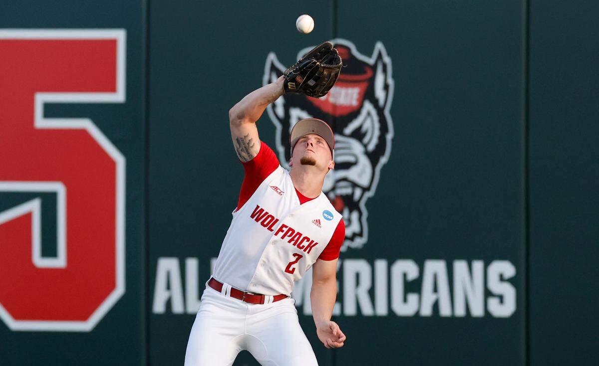 N.C. State’s Noah Soles (2) catches a fly ball during N.C. State’s game against Bryant in the NCAA Raleigh Regional at Doak Field Friday, May 31, 2024.