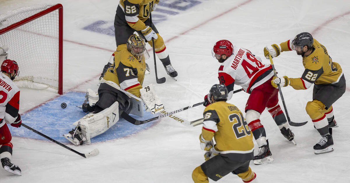 Carolina Hurricanes left wing Jordan Martinook (48) scores on Vegas goalie Carter Hart (79) to cut the Vegas lead to 4-1 in the third period in Game 3 of the Stanley Cup Final, on Saturday, June 6, 2026 at T-Mobile Arena in Las Vegas, NV.