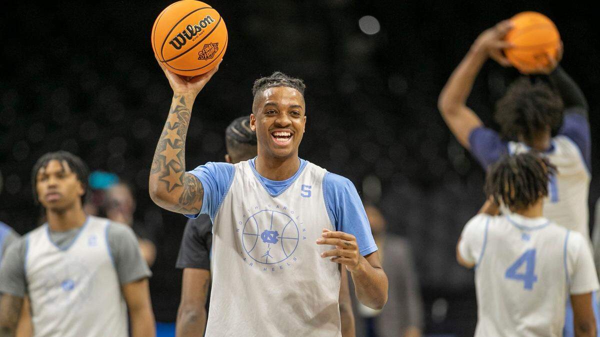 North Carolinas Armando Bacot (5) flashes a smile as he works out with his teammates as the Tar Heels prepare for their NCAA East Regional semi-final game against UCLA on Thursday, March 24, 2022 at Wells Fargo Center in Philadelphia, Pa.