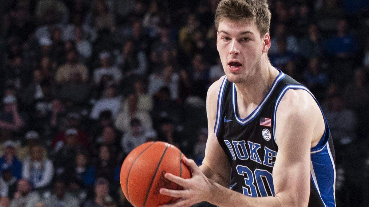 Duke center Kyle Filipowski drives to the basket in the first half of an NCAA college basketball game against Georgia Tech, Saturday, Jan 28, 2023, in Atlanta. (AP Photo/Hakim Wright Sr.)