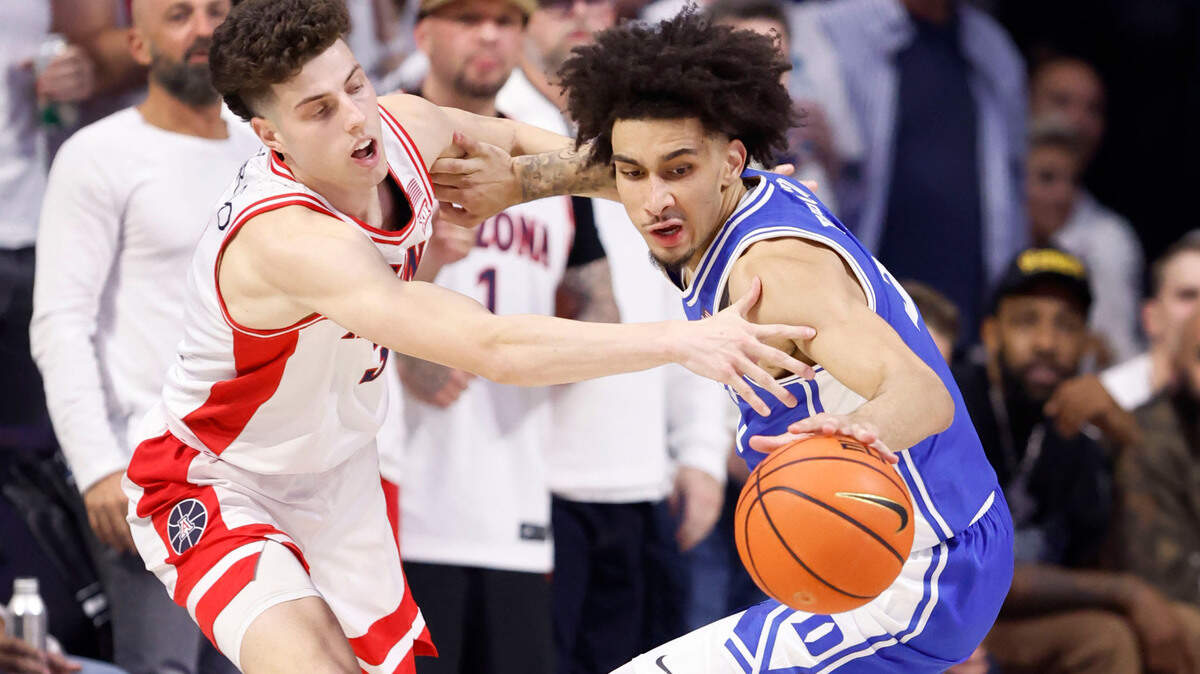 Duke’s Tyrese Proctor (5) steals the ball from Arizona’s Anthony Dell’Orso (3) during the first half of Duke’s game against Arizona at the McKale Memorial Center in Tucson, Ariz., Friday, Nov. 22, 2024.