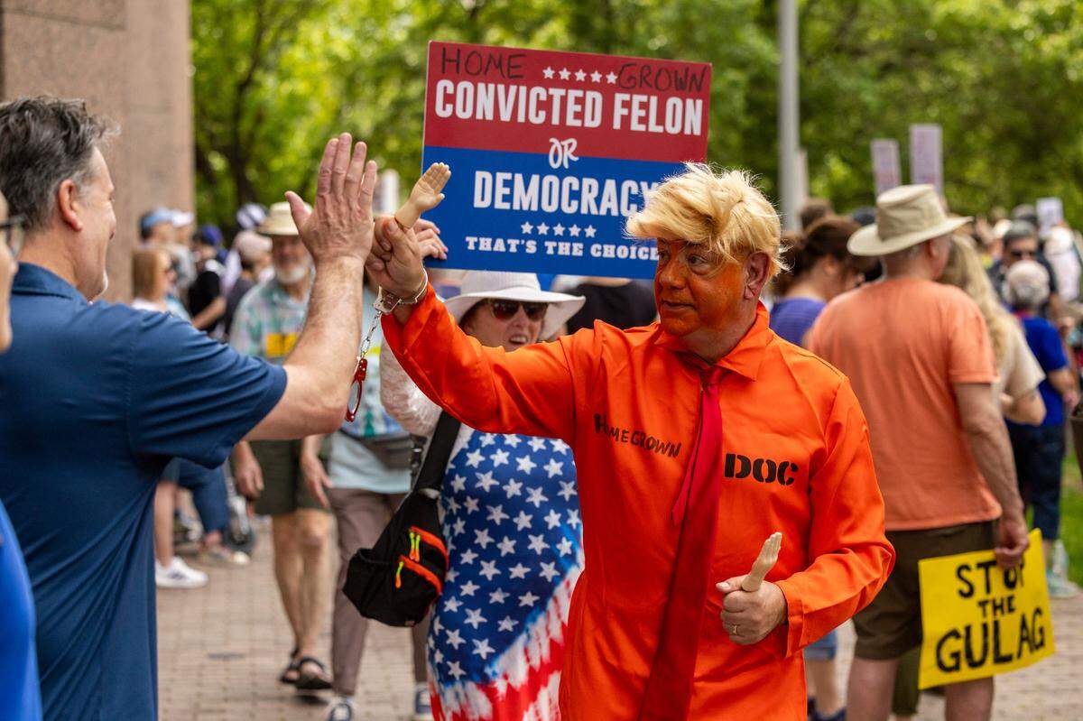 More than 1000 demonstrators rally on Halifax Mall in Raleigh before marching around the Legislative Building to protest Trump administration policies on Saturday, April 19, 2025.