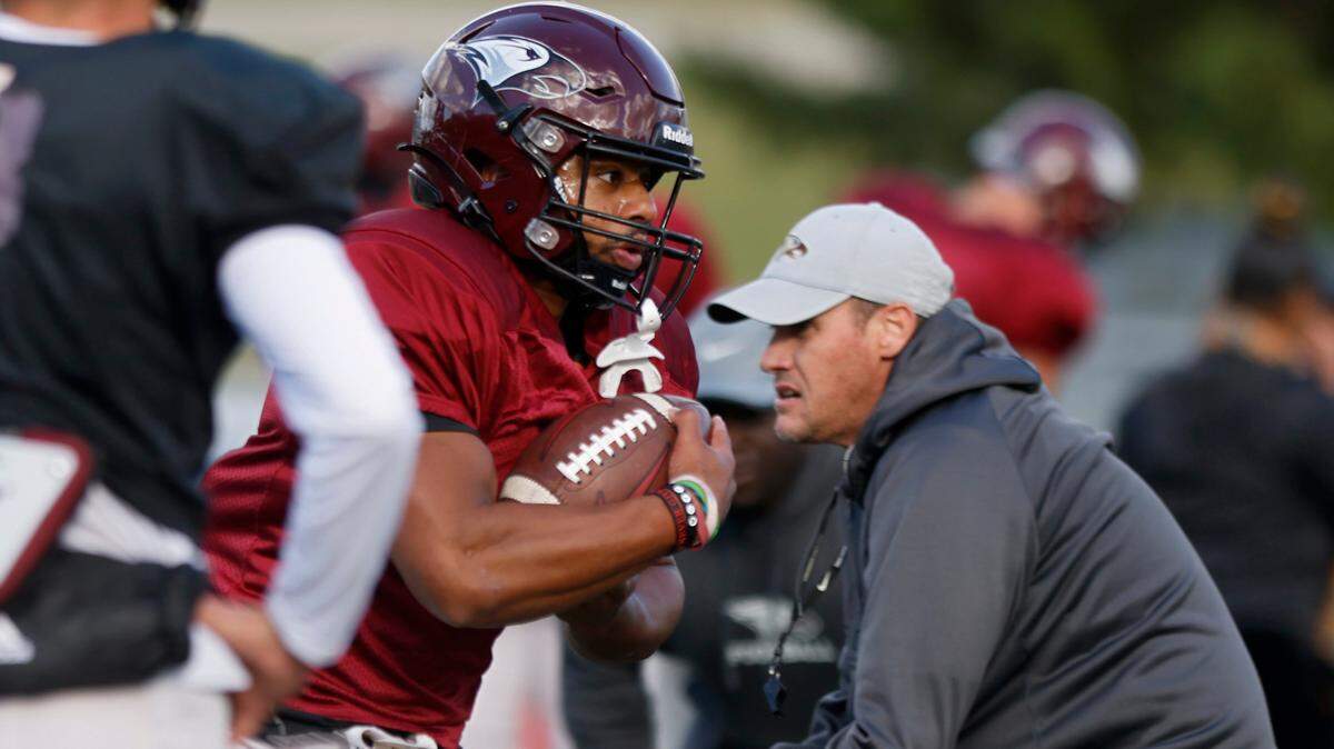 North Carolina Central’s Latrell Collier runs the ball during practice at O’Kelly-Riddick Stadium on Tuesday, Oct. 18, 2022, in Durham, N.C.