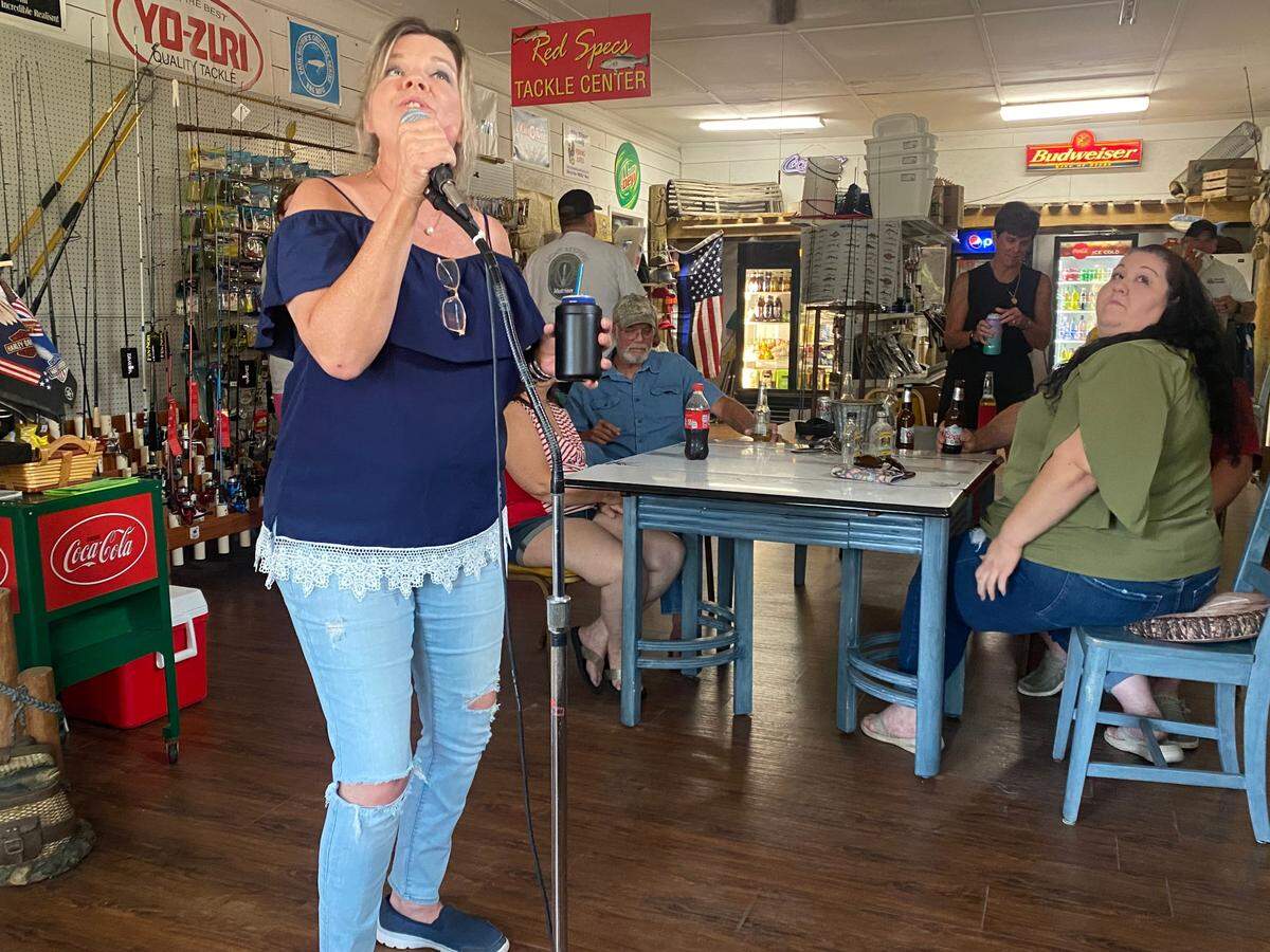 Crystal Paul is nicknamed “Delta Dawn” at Squidders Bait & Tackle, where she regularly sings on Saturday night in what is probably the world’s only bait shop and karaoke bar.
