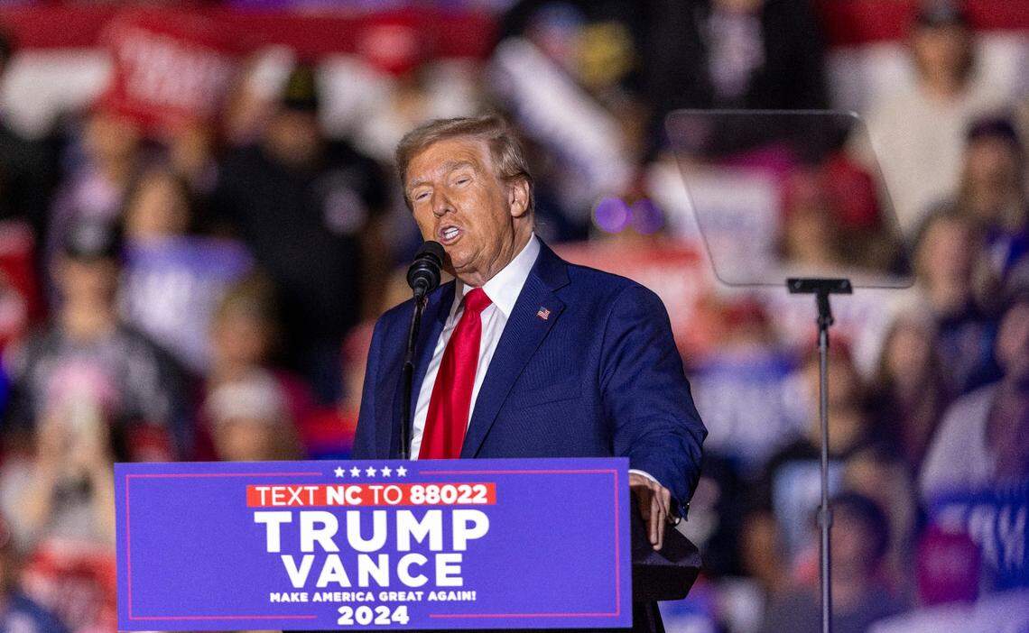 Former President Donald Trump speaks during a rally at Minges Coliseum in Greenville on Monday, Oct. 21, 2024. With two weeks until Election Day, Trump went on a three-city tour, in which Trump will also see the destruction caused by Hurricane Helene in Asheville and speak at a faith conference in Concord.
